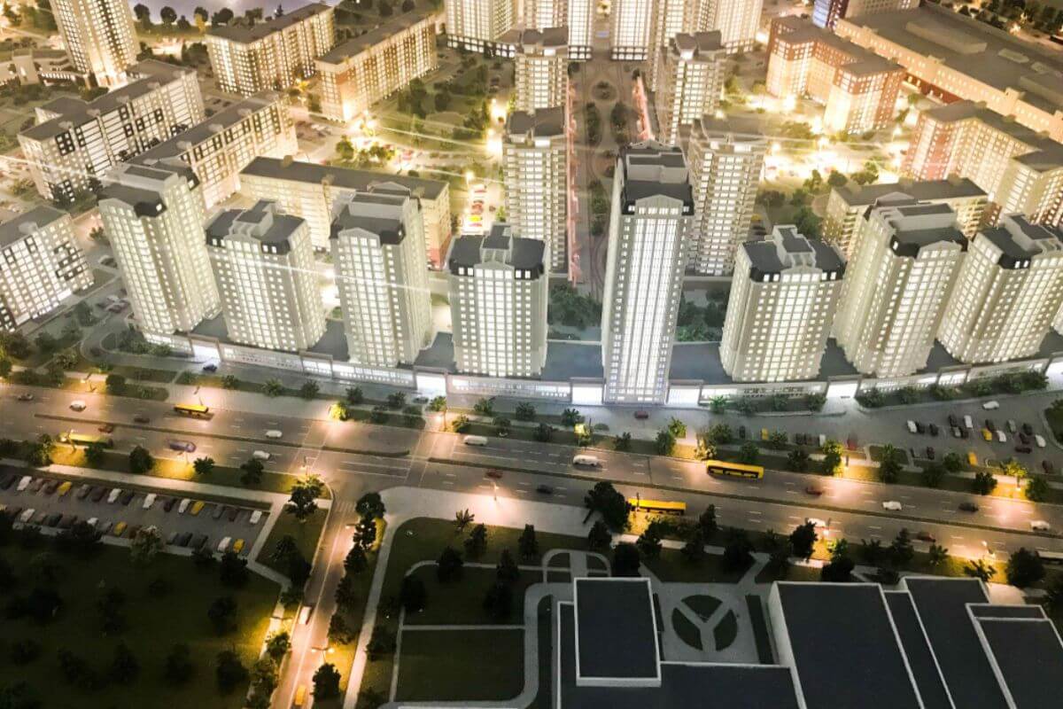 Artist’s perspective of a luxury condominium in a prime location, featuring modern architecture and an upscale urban environment.
