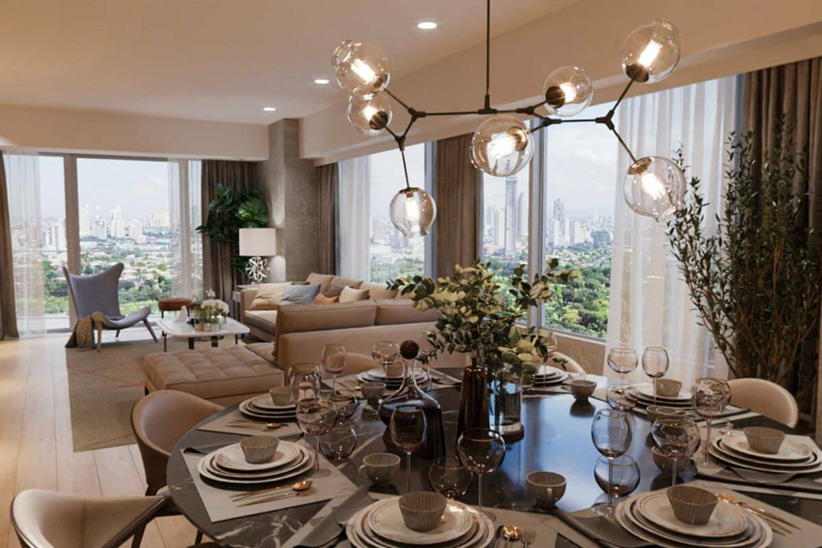 Elegant condominium dining and living area with city views highlighting refined residential design and planning