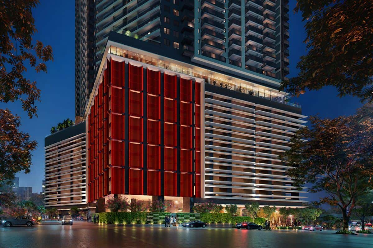 Modern Shang Properties residential development with illuminated red architectural accents and landscaped street-level surroundings