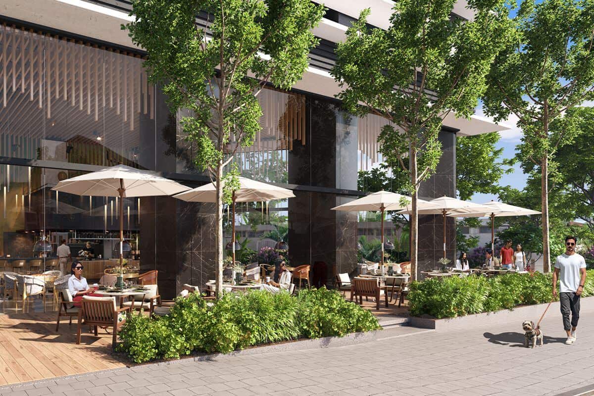 Landscaped mixed-use development with outdoor dining, walkable spaces, and neighborhood amenities that support long-term property value