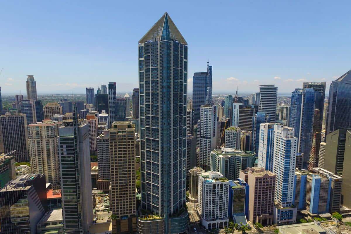 High-rise buildings in a dense urban business district illustrating residential, commercial, and lifestyle spaces within a connected mixed-use environment