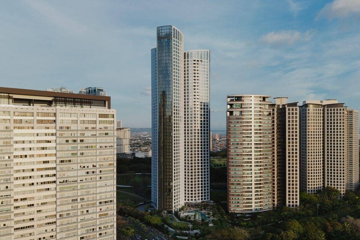 Shang Properties luxury residential towers surrounded by established city buildings and landscaped green spaces